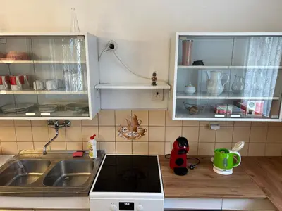 a kitchen with a sink and a counter top at Prague apartment - Close to airport and metro in Prague