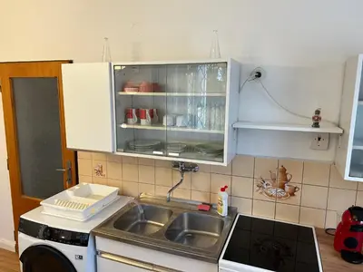 a kitchen with a sink and a dishwasher at Prague apartment - Close to airport and metro in Prague