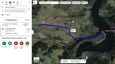 a map of a road with a blue line at Apartmány v Buši in Buš