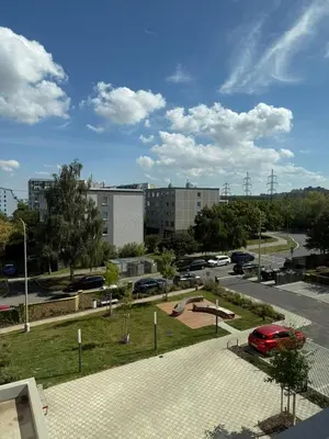 a parking lot with a park with a skate park at ObriyPraha in Prague