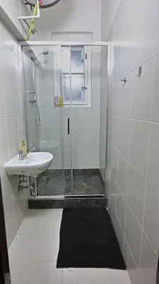 a bedroom with a bed and a window at Station Stay Rooms near Main Train Station in Prague