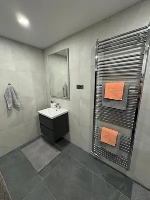 a bathroom with a sink and a shower at Luxury 2BR Apartment Best Location Prague in Prague