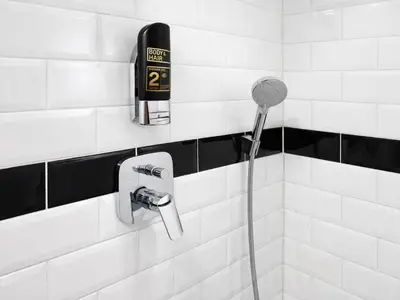 a shower with a blow dryer in a bathroom at Pawlovnia Hotel in Prague