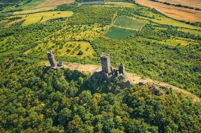 an aerial view of a castle on a hill at Kovárna Klapý pod Hazmburkem - České středohoří in Klapý