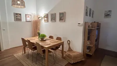 a dining room with a table and chairs at Cozy apt in the heart of Old town in Prague