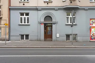a building with a door on the side of a street at Cozy & Spacious Apartment for 5 Guests in Prague in Prague