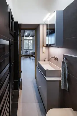 a small bathroom with a sink and a toilet at Cozy apartment in Vinohrady café & culture zone in Prague
