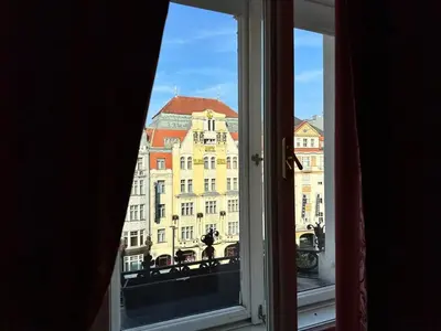 a view of a large building from a window at Luxury flat in Wenceslas Square in Prague
