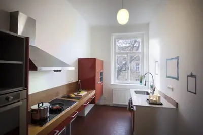 a kitchen with a sink and a counter top at Spectacular Riverview apartment in Prague