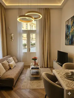 a living room with a couch and a table at Beautiful apartment with terrace in center of Prague in Prague