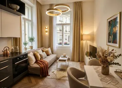 a living room with a couch and a table at Beautiful apartment with terrace in center of Prague in Prague