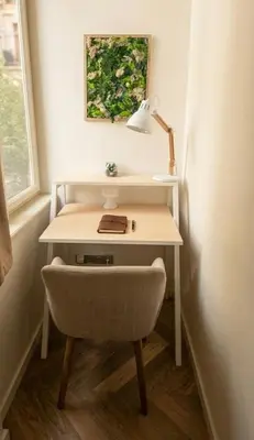 a desk with a lamp and a chair in a room at Beautiful apartment with terrace in center of Prague in Prague