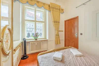 a bedroom with a bed and a window at 3BR Apartment in Old Town - Self Check-in - Prague 1 - Sleep up to 8 in Prague