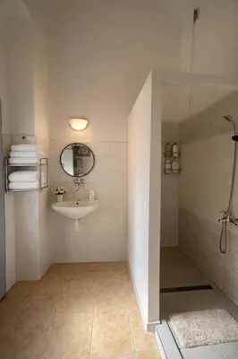 a bathroom with a sink and a shower at Lidická 31 Apartment Prague ,2 Bedrooms ,8 Guests ,Near Center in Prague