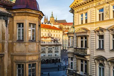 a view of the city of vienna with buildings at Prague Castle View by Charles Bridge in Prague