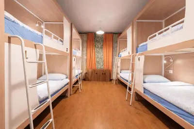 a room with bunk beds in a hostel at Luna Female Hostel in Prague