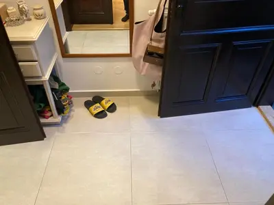 a kitchen with a floor with shoes on the floor at Wenceslas Square Center in Prague