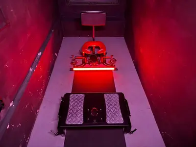 an overhead view of a red light on a boat at Playroom Prague Vinohrady in Prague