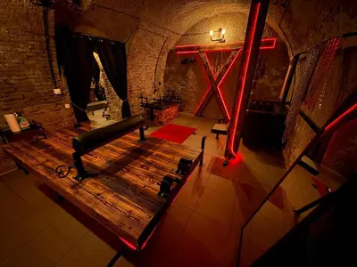 an overhead view of a wooden bench in a room at Playroom Prague Karlín in Prague