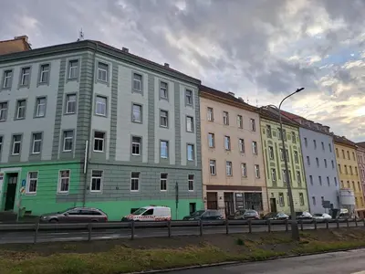 a row of buildings on the side of a street at Cozy and newly equipped apartment in Prague