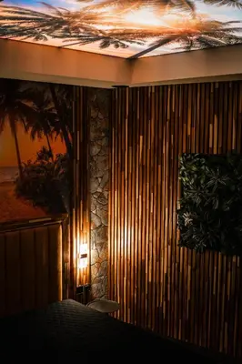 a bedroom with a bed and a painting on the wall at Coco Suite Private Spa and Jacuzzi Prague Center in Prague