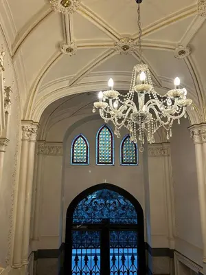 a large room with a chandelier and a window at Design Loft near National Theatre in Prague