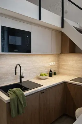 a kitchen with a sink and a microwave at Design Loft near National Theatre in Prague