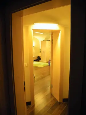 a room with a hallway with a room with a hallway at Apartment Trziste in Prague