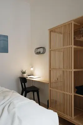a hallway with a white door and a mirror at Stylish Architect Apartment Prague 1 Best Location in Prague