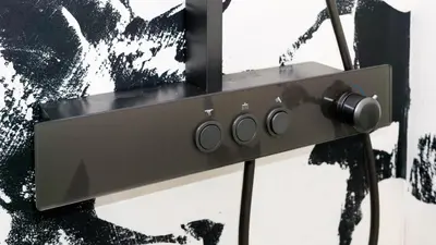 a close up of a remote control on a wall at Black & White Apartment Prague by Wenceslas Square and Muzeum in Prague