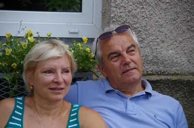 a man and a woman sitting next to each other at Penzion Schola in Noutonice