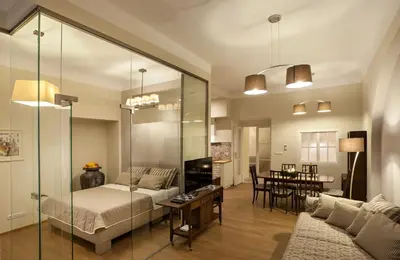 a living room with a bed and a table at Igor and David Apartments in Prague