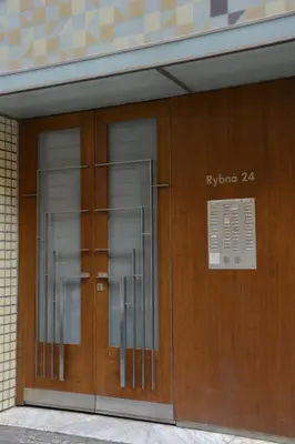 a pair of glass doors in a building at Apartment Aida in Prague