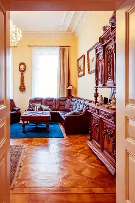 a living room with a couch and a table at Apartment Vodičkova 11 in Prague