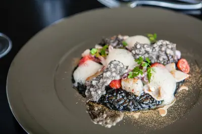 a plate of food sitting on a table at MG Restaurace/Luxury Apartments in Mladá Boleslav