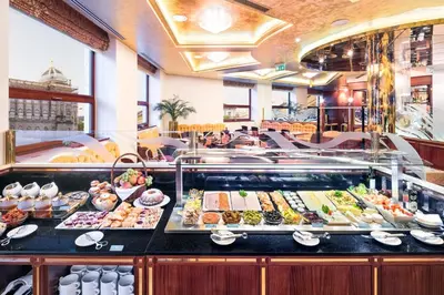 a buffet line with many different types of food at Occidental Praha Wilson in Prague