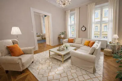 a living room with two couches and a coffee table at Wishlist Old Prague Residences - New Town in Prague