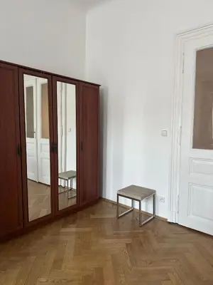 a room with a large mirror and a table at Apartment Skorepka 4 in Prague