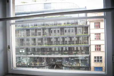 a view of a building from a window at Onefam Old Town in Prague