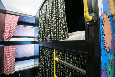 a room with a bunk bed and a bunk bed at Brix Hostel in Prague