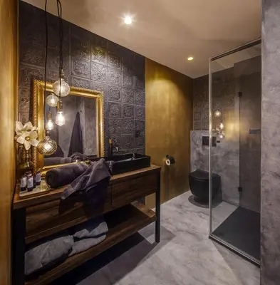 a bathroom with a sink and a shower at Royal Apartmány in Dobříš