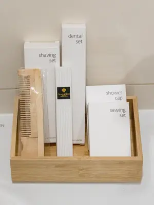 a wooden shelf with several books on it at Romantic Bohemian Studio in Old Town Prague in Prague