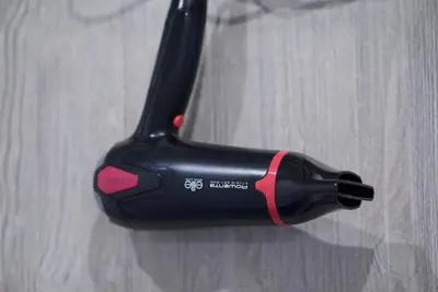 a black bike rear derailleur with a red strap at Romantic Bohemian Studio in Old Town Prague in Prague