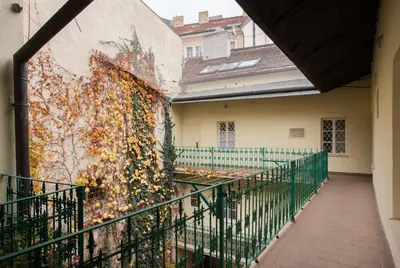a mural on the side of a building at Bohemian Chic 2 Bedroom 2 Bathroom Loft with Hanging Chair in Prague