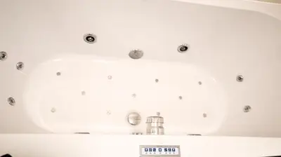 a room with a white ceiling with buttons on it at Apartment by the Old Town Square in Prague