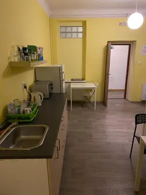 a kitchen with a sink and a counter top at Easy Housing in Prague