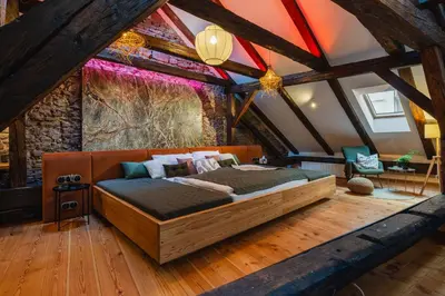 a bedroom with a bed in a attic at Old Town Apartment in Prague