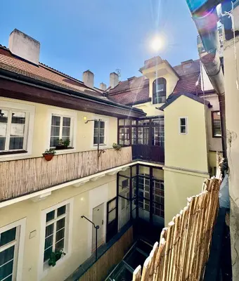 a view of a building with a balcony at Apartmány Nerudova 36 in Prague