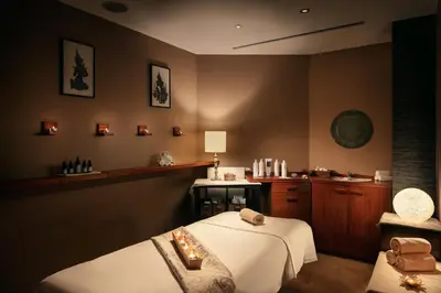 a room with a bed and a kitchen with a sink at Hotel KINGS COURT in Prague
