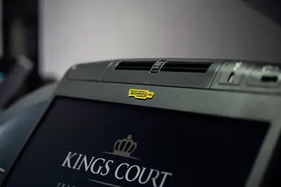 a sticker on the side of a laptop computer at Hotel KINGS COURT in Prague
